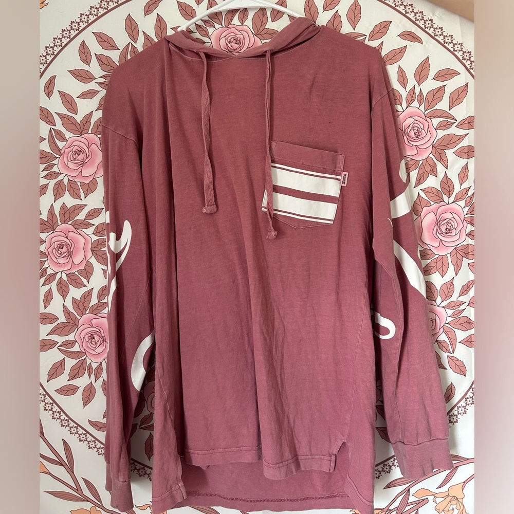 A light pink long sleeved top from PINK Victoria Secret. Also has a hood :)